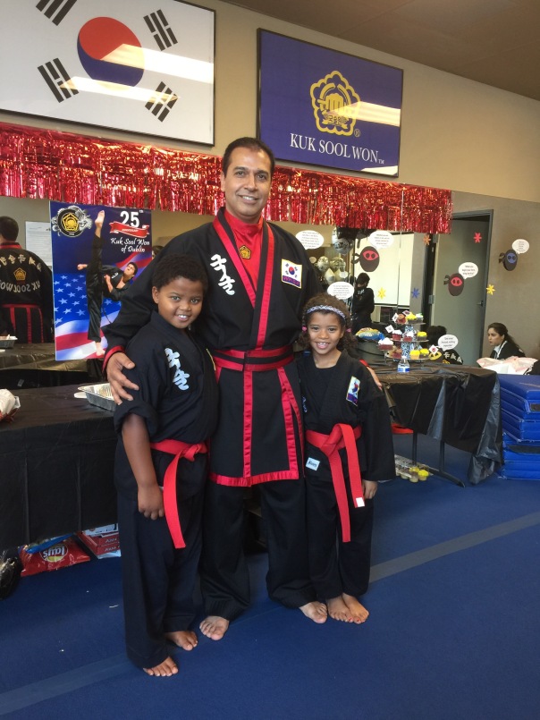 Master Saidi and students with their new red belts